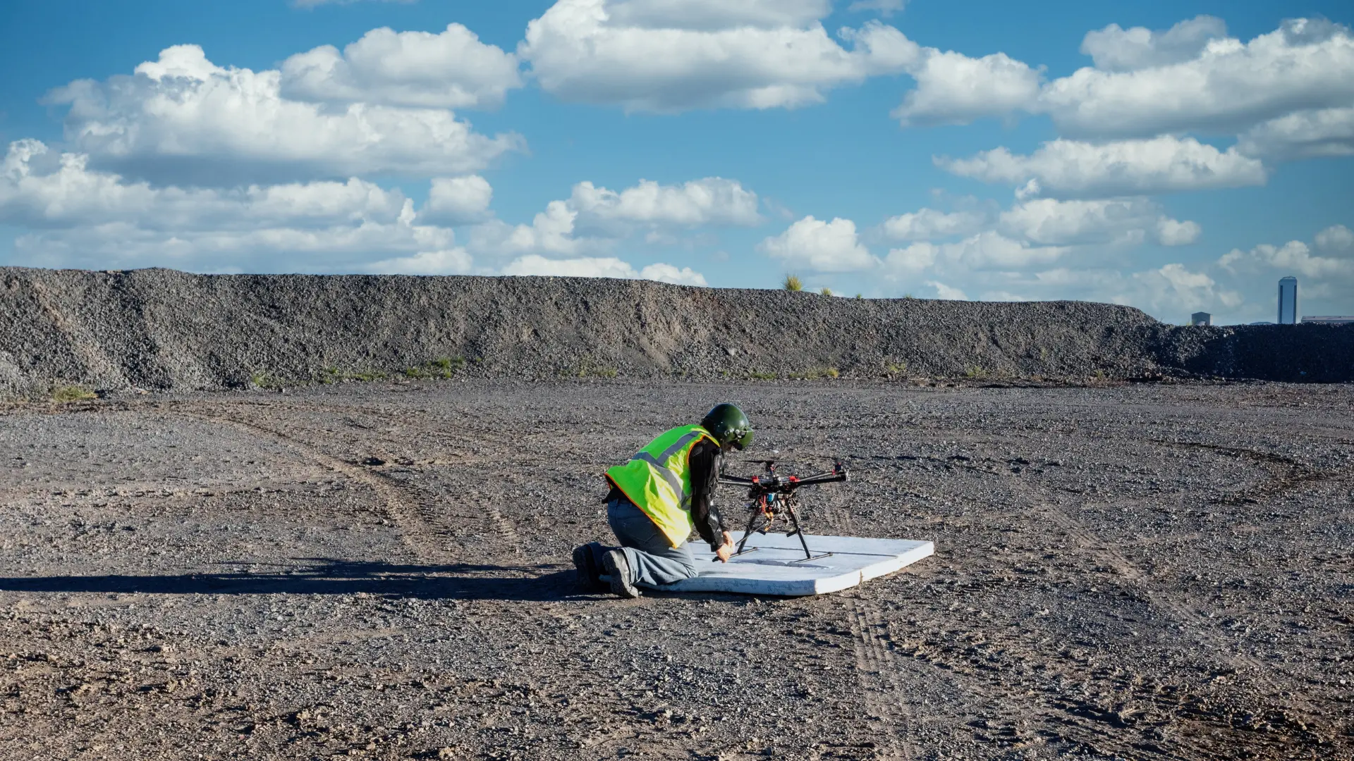 man setting up drone