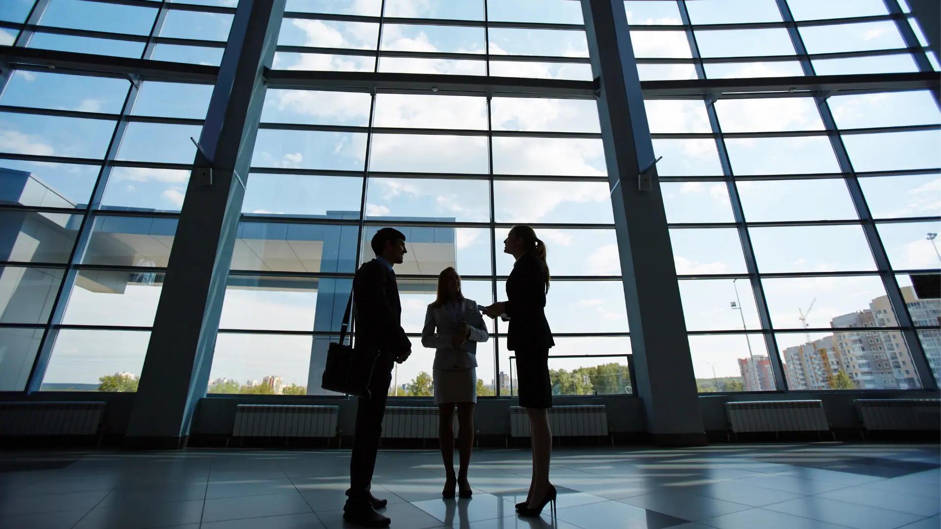 img of man and women having meeting